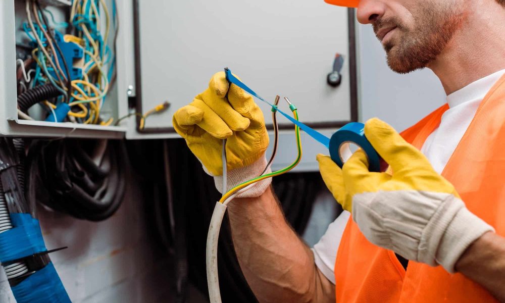 https://baytalysr.com/wp-content/uploads/2025/05/cropped-view-of-electrician-using-insulating-tape-while-fixing-wires-of-electric-panel-qsy5dnzdme9ozuubhge95nti9vre7ka07892woi4xc-1.jpg